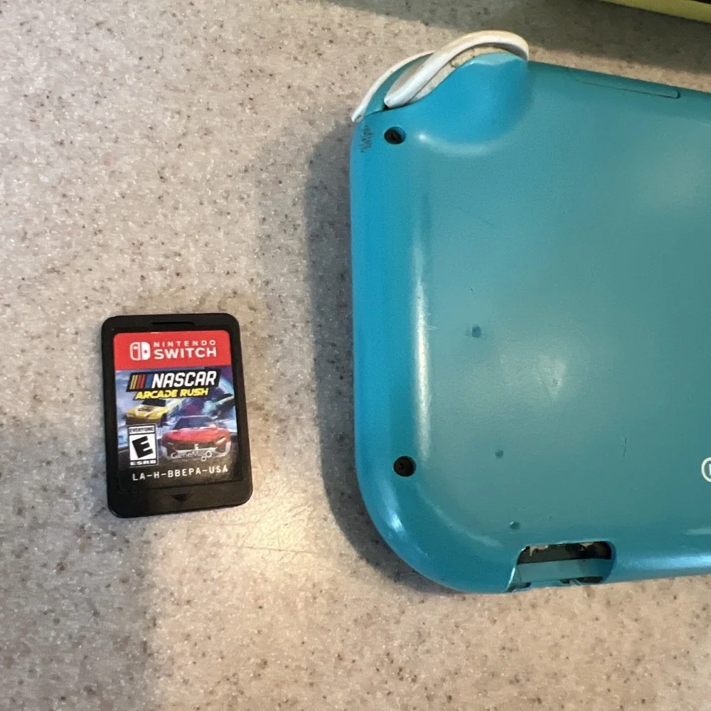 Nintendo Switch Lite Handheld Teal with Pikachu Case One Game And Console Case